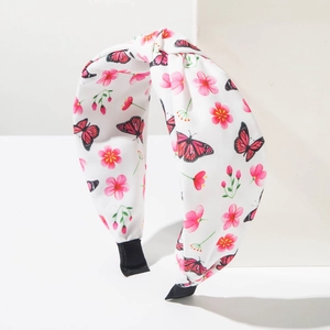 Bandeau bohème large à nœud avec imprimés papillons et fleurs, design élégant.