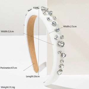 Luxurious white padded headband with sparkling geometric crystals and non-slip suede lining