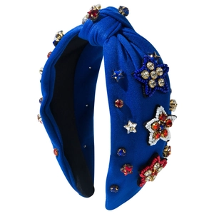 Navy blue knotted headband with USA flag colored rhinestones and beaded stars