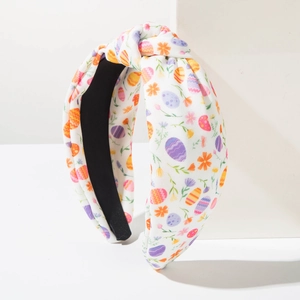 Easter egg floral print knotted fabric headband with minimalist white spring holiday design