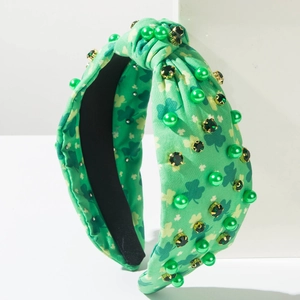 Saint Patrick's Day green knotted headband with shamrock print, pearls and rhinestones