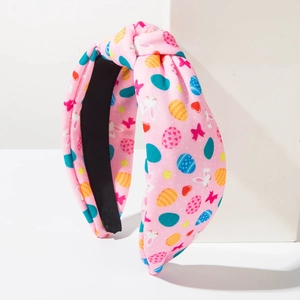 Pink knotted fabric headband with Easter bunny and colorful egg prints for women