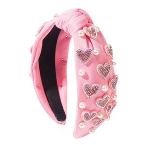 Pink knotted headband with heart-shaped rhinestones and pearls for Valentine's Day