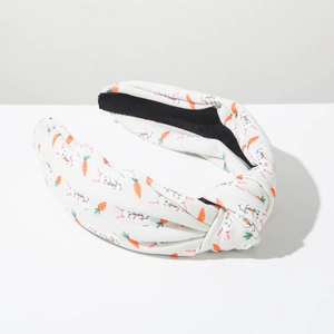 Detail showing Easter bunny and carrot fabric knot headband with black non-slip lining