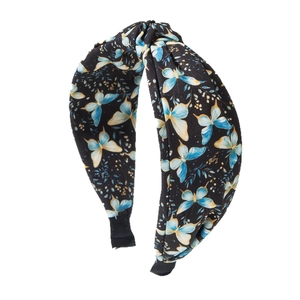 Serre-tête bohème à nœud avec imprimé papillon bleu sur tissu noir aux motifs floraux