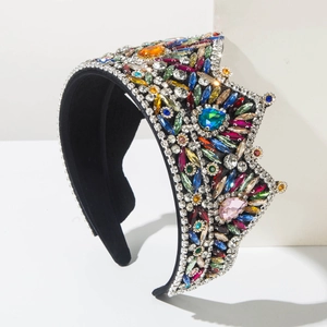Macro detail of luxury baroque headband with colorful crystals on thick black base