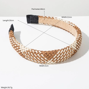 Bohemian hand-woven raffia headband in gold and white with soft inner lining