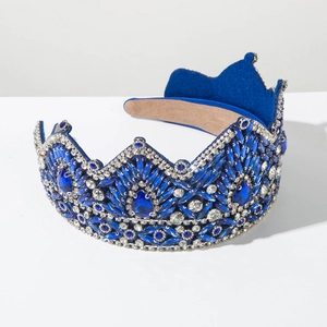 Detailed view of Baroque crown headband with royal blue rhinestones and velvet lining