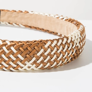 Detail view of Bohemian woven raffia headband showing bronze and cream texture