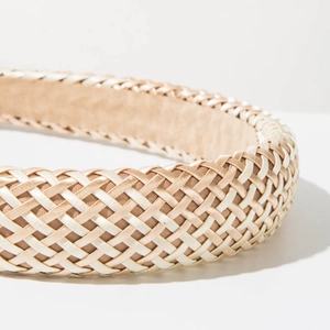 Detail of woven champagne and cream silk headband with non-slip velvet lining