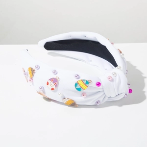 Easter headband with white knotted fabric, colorful pearls, and cute bunny egg charms