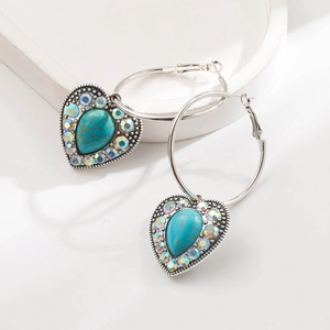 Bohemian heart earrings with turquoise stones and iridescent rhinestones on silver hoops