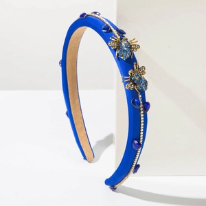 Baroque style royal blue headband with rhinestone bees and large sapphire blue gemstones