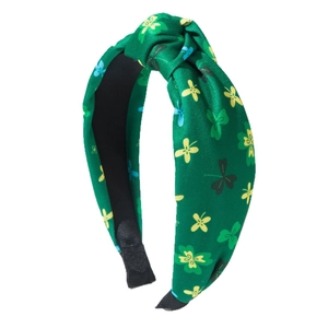 St. Patrick's Day green knotted headband with colorful clover patterns for festive hair decor