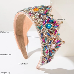Baroque crown headband with colorful rhinestones and large gemstones on white stand