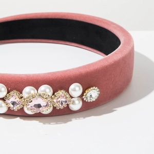 Detail of pink velvet headband with luxury pearls and pink crystal embellishments