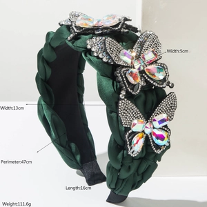 Luxurious handmade woven green headband with sparkling rhinestone butterfly accents