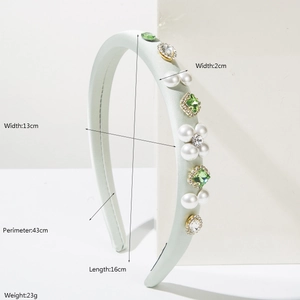 Elegant green fabric headband with pearls and crystals featuring detailed measurements