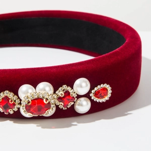 Detail showing red velvet headband with Baroque pearls and sparkling rhinestones inlay