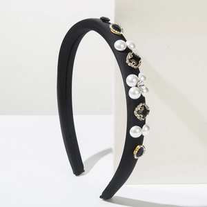 Elegant wide black headband with white pearls and sparkling rhinestones for women