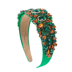Serre-tête en velours vert de style baroque avec fleurs en cristal et pierres émeraudes
