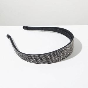 Close-up of slim black headband featuring full sparkling silver rhinestone embellishments