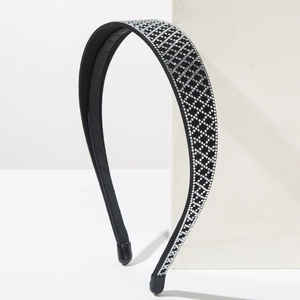 Retro luxury headband featuring sparkling silver rhinestones in a lattice pattern on black fabric