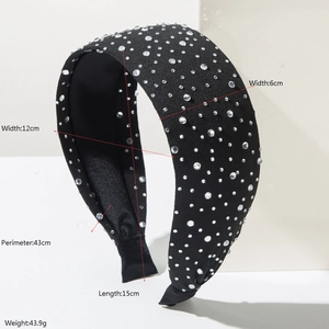 Elegant wide padded headband with sparkling crystals on black woven base for women