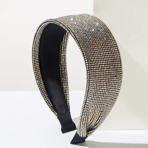Sparkling black wide headband with full crystal rhinestones on minimalist white background