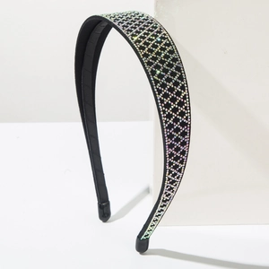 Detail of crystal headband with rainbow rhinestones in a diamond grid pattern