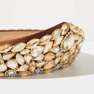 Macro detail of Baroque headband featuring densely inlaid champagne teardrop crystals