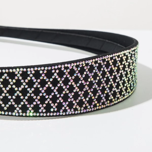 Close-up of retro black velvet headband with luxury colorful rhinestone diamond mesh