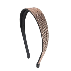 Sparkling rhinestone headband with champagne crystals and comfortable black base