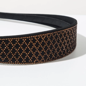 Close-up of luxury vintage headband featuring brown rhinestones in a diamond pattern