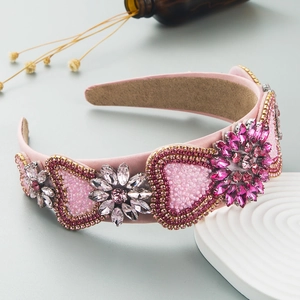 Luxury pink padded headband with sparkling crystals and floral baroque embellishments