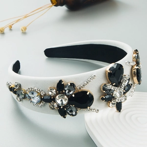 Elegant white Baroque headband featuring sparkling black and clear crystal floral designs