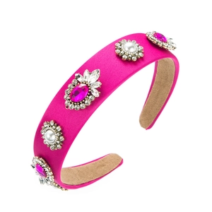 Padded magenta velvet headband featuring baroque pearls and pink rhinestone jewels