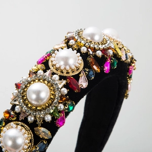 Detail shot of Baroque velvet headband featuring chunky pearls and multi-color rhinestones