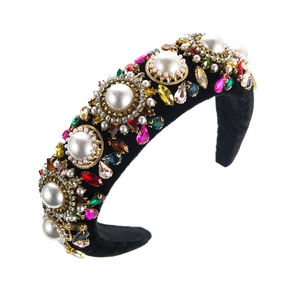 Baroque wide velvet headband with white pearls and colorful rhinestones on white background