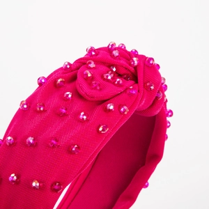 Elegant magenta knotted fabric headband featuring handmade crystal bead embellishments
