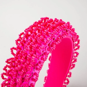 Handmade bright pink sequin and beaded wide headband with a rich textured finish