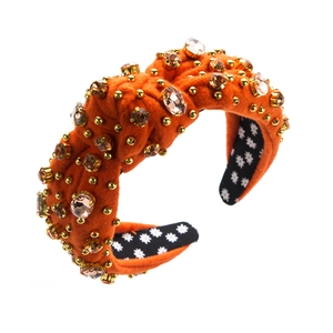 Vintage orange velvet knotted headband with amber rhinestones and gold rivets for women