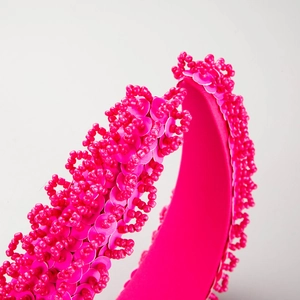 Handmade hot pink padded headband with luxury sequins and beadwork for fashion hair styling