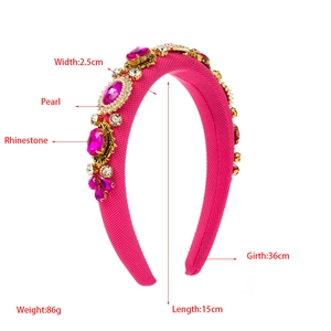 Detailed view of baroque headband with pink rhinestones, pearls, and golden accents
