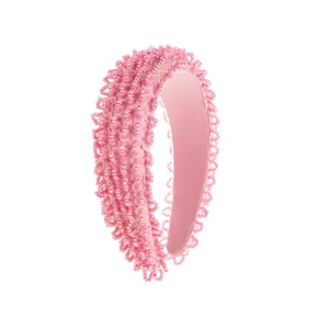 Detail of pink wide headband featuring handmade beads and sequins on satin fabric