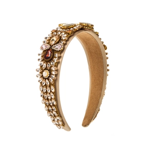 Detail of baroque headband with rhinestones, pink gems, and white pearl embellishments