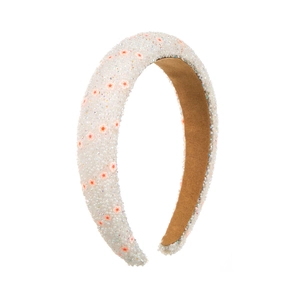 Detail of beaded padded headband with white translucent beads and orange floral pattern