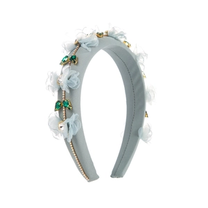 Serre-tête floral bleu élégant avec strass émeraude et chaînes dorées pour femmes