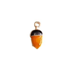 Golden acorn pendant with orange and black enamel finish for DIY jewelry crafts