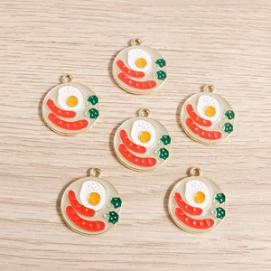 DIY colorful breakfast pendants with fried eggs and sausages on gold metal base